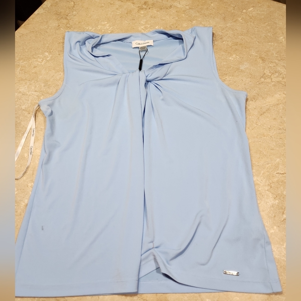 Calvin Klein,Women's Medium Top. Light sky blue color